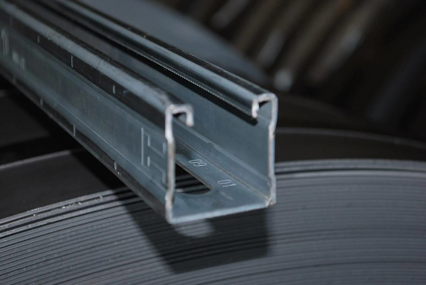 Custom steel profile manufactured through cold roll forming